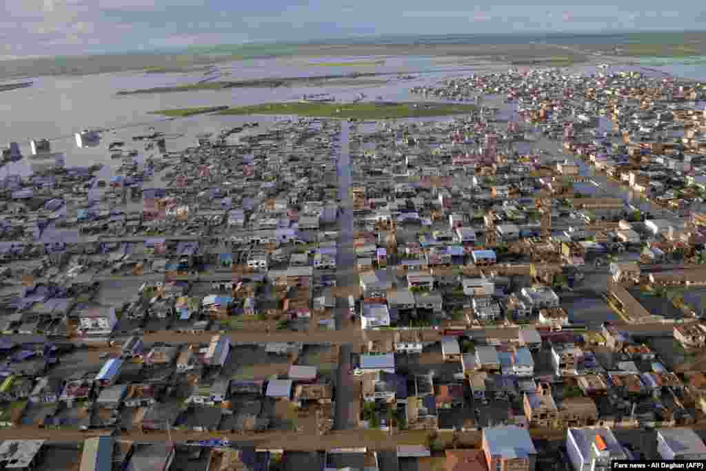 Flooded streets in the northern Iranian village of Agh Ghaleh on March 23, 2019.