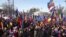 Moldovan supporters of reunification with Romania rally in Chisinau.