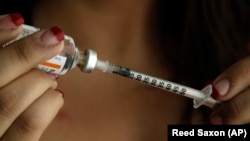 Iranian media say that for months, Health Ministry officials have called on doctors to prescribe their patients insulin injections using syringes, which critics describe as impractical.