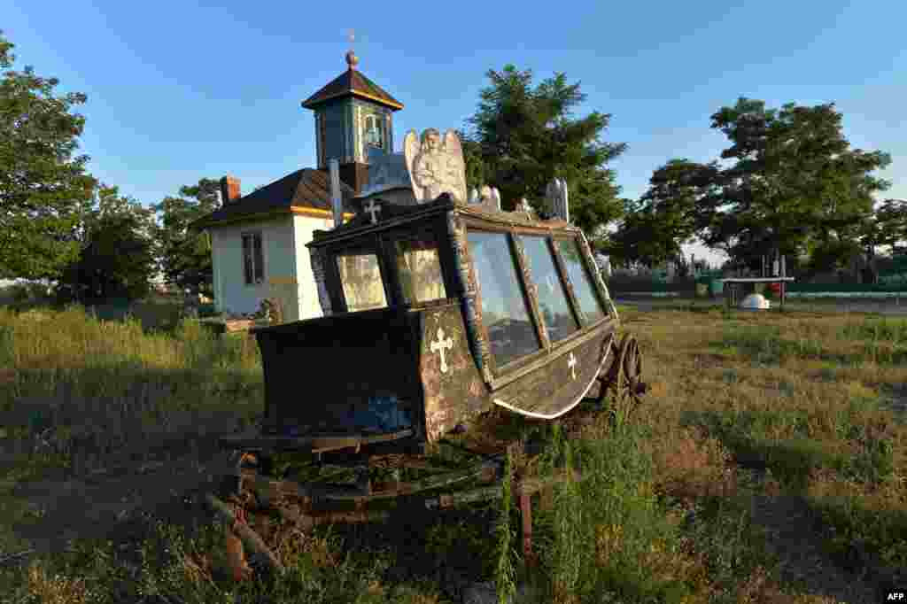 An old hearse is pictured at a historic cemetery in Sulina, Romania. (AFP/Daniel Mihailescu)