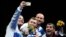Russian fencer Sergei Bida (left) with teammates after winning a silver medal in the men's epee event at the Tokyo Olympic Games in 2021. 