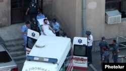 Armenia - Aram Manukian, an opposition gunmen wounded by security forces, is taken to a Yerevan court in an ambulance, 23Aug2016