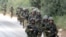 Israeli soldiers on patrol near the border with Lebanon on July 13
