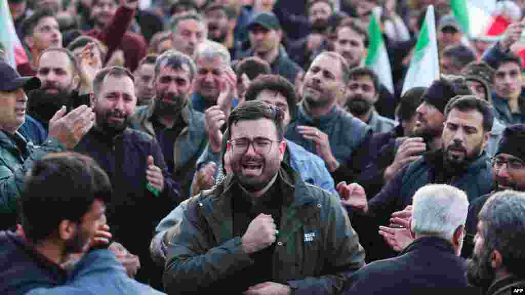 Iranians mourn the death of Ayatollah Ali Khamenei in Tehran on February 28 after Iran's supreme leader was killed in US‑Israeli airstrikes. 