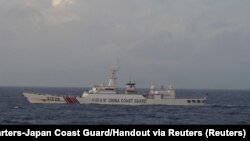 Plovilo kineske obalne straže br. 31239 plovi u Istočnom kineskom moru u blizini spornih otočića poznatih kao otoci Senkaku u Japanu i otoka Diaoyu u Kini.