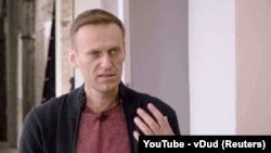 Russian opposition politician Aleksei Navalny speaks during an interview on October 6.