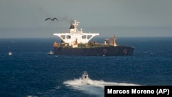 GIBRALTAR -- Supertanker Adrian Darya hosting an Iranian flag is seen on the water in the British territory of Gibraltar, August 18, 2019