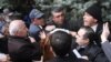 Armenia - Riot police and opposition activists scuffle in Yerevan's Liberty Square, 14Mar2013.