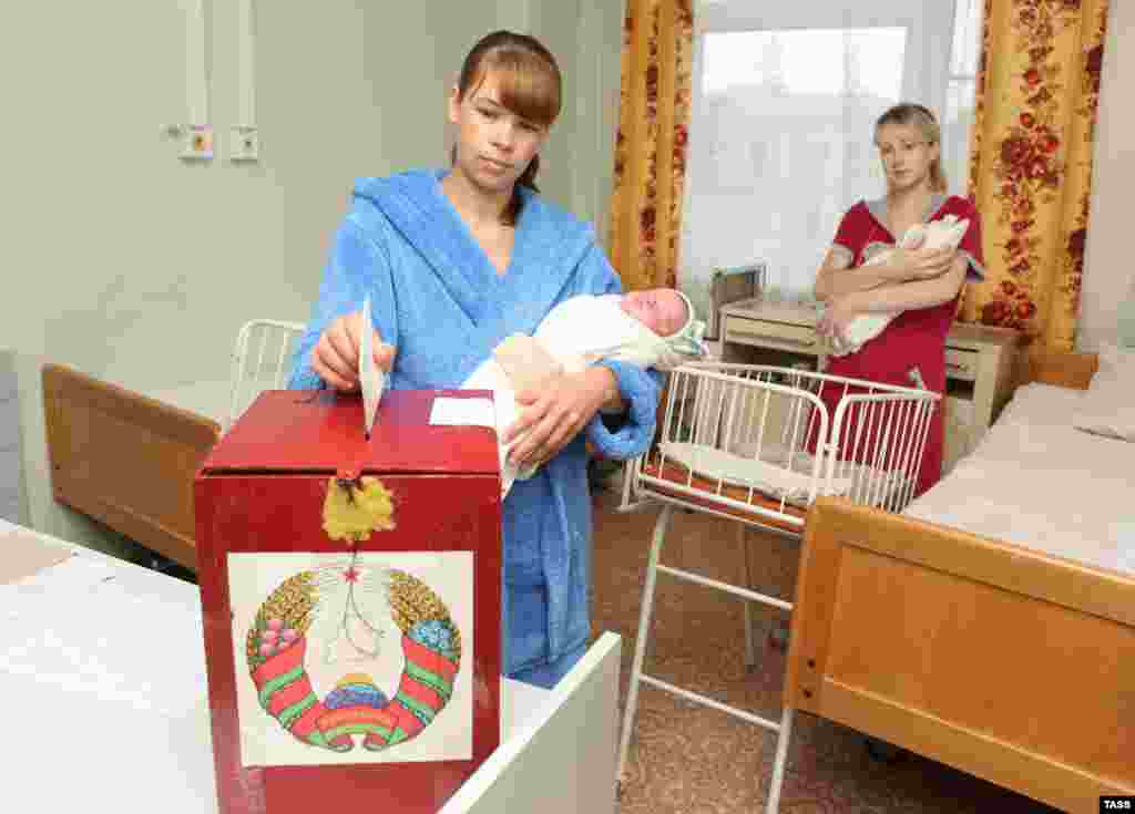 A woman casts her vote at a maternity ward in Mogilev.