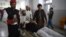Pakistani medics move an injured security officer for treatment following a bomb attack in the Mohmand tribal district. 