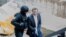 Moldova -- former PM Vlad Filat, escorted by police, Chisinau