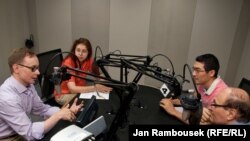 Host Pavel Butorin (left) discusses the 1991 Soviet putsch with Natalia Churikova of our Ukrainian Service (second from left), Alisher Sidikov from the Uzbek Service, and Harry Tamrazian of our Armenian Service.