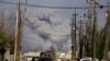 Smoke rises after an air strike in western Mosul on March 10, 2017.