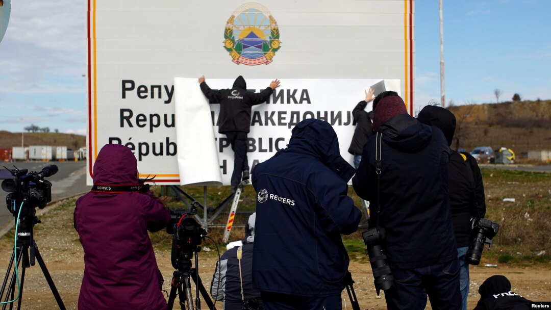 Billboards are changed from Republic of Macedonia to Republic of Northern Macedonia along the border with Greece on February 13.