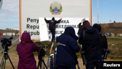 Billboards are changed from Republic of Macedonia to Republic of Northern Macedonia along the border with Greece on February 13.