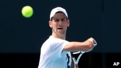 Serbian tennis star Novak Djokovic practices ahead of the Australian Open.