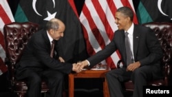 U.S. President Barack Obama (right) meets with Libya's National Transitional Council Chairman Mustafa Abdel Jalil at the United Nations in New York.