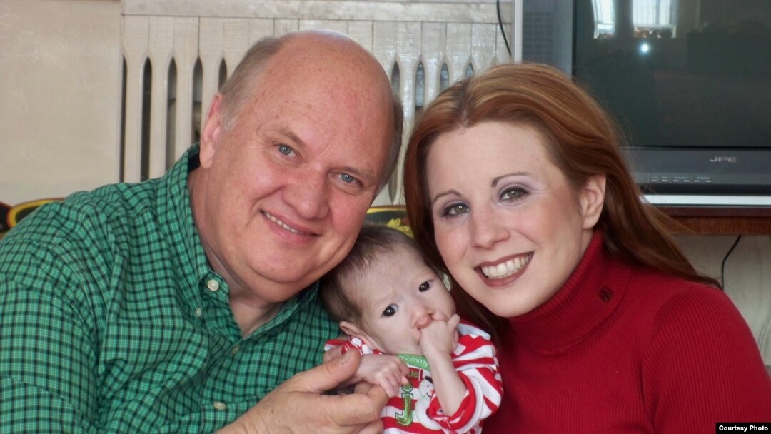 U.S. citizens Frank and Gabrielle Shimkus with their prospective Kyrgyz adoptee Azamat