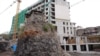 Armenia - A new building is constructed in the center of Yerevan in place of old homes demolished with government permission, April12, 2025.