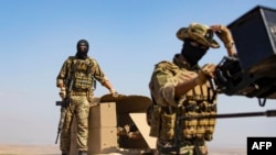 تصویری از عملیات پیشین نیروهای سوری و ائتلاف بین‌المللی علیه گروه دولت اسلامی در این کشور