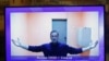 روسي مخالف مشر "الکسي نوالني" له خپلویانو بیا د لاريونونو غوښتنه وکړه