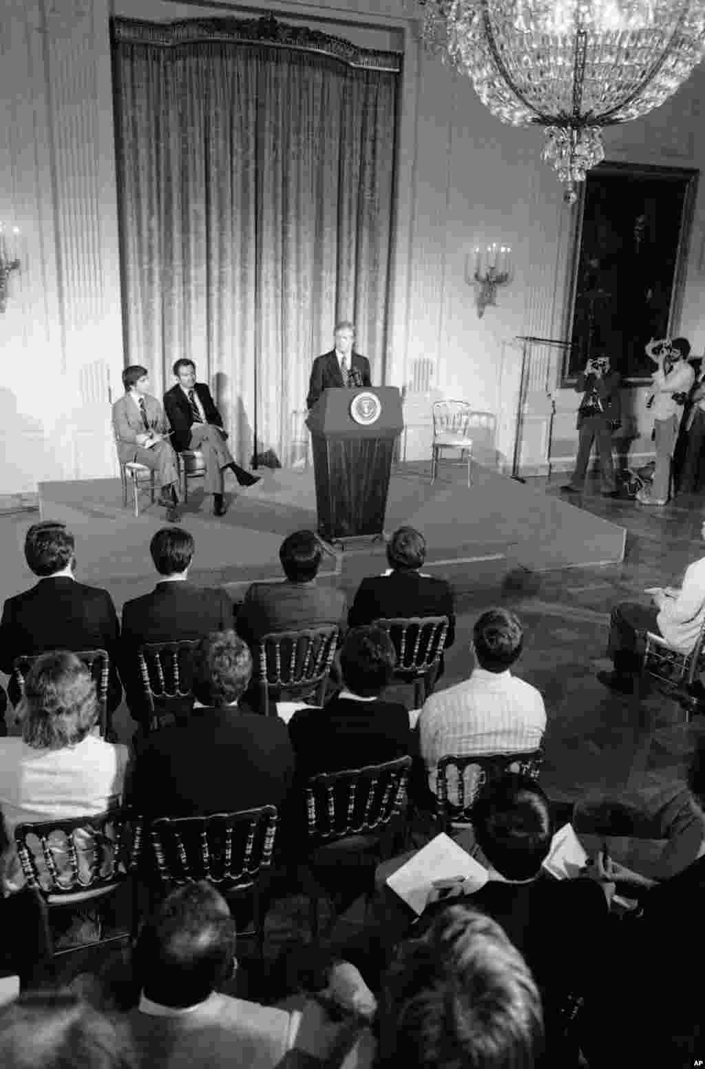 U.S. President Jimmy Carter addresses athletes scheduled to compete in the Moscow Olympics on March 21, 1980. Carter asked them to support a proposed boycott of the competition as retaliation for the Soviet invasion.