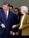 French President Emmanuel Macron (left), Chinese leader Xi Jinping (center), and European Commission President Ursula von der Leyen (right) leave after holding a trilateral talks in Paris in 2024. 