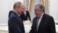 Russian President Vladimir Putin (left) and UN Secretary-General Antonio Guterres (file photo)