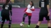 Former Afghanistan women's football captain Khalida Popal (center) has spoken out previously about the discrimination women players face.