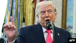 US President Donald Trump speaks during a swearing-in ceremony for new Homeland Security Secretary Markwayne Mullin in the Oval Office on March 24.