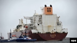 A liquified-natural-gas tanker from Qatar enters the terminal port of Swinoujscie in Poland