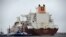 A liquefied-natural-gas tanker from Qatar enters the terminal port of Swinoujscie in Poland
