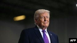 US President Donald Trump arrives to speak in Hebron, Kentucky, on March 11.
