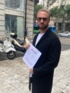 Belgrade - Belarusian activist Andrey Gnyot submits the appeal of public figures for his release to the President of Serbia, August 16, 2024