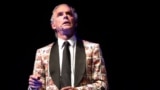 Jordan Peterson wears a religious-themed suit designed by Dimitry Toukhcher.