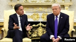 Генеральний секретар НАТО Марк Рютте і президент США Дональд Трамп у Білому домі
