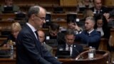 Macut presents his exposé to the Serbian parliament in Belgrade on April 15.