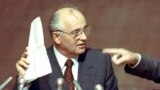 ** FILE ** Soviet President Mikhail Gorbachev, left, holds notes given to him by Russian Federation President Boris Yeltsin, right, during a special session of the Russian Federation Parliament in this Friday, August 23, 1991, file photo. Yeltsin, who en