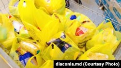 O campanie de colectare a produselor alimentare organizată de Misiunea socială „Diaconia” a Mitropoliei Basarabiei. Imagine de arhivă