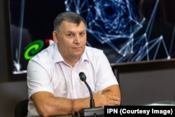 Directorul Institutului de Energetică al Academiei de Științe a Moldovei, Mihai Tîrșu, vorbind la o dezbatere publică la agenția de presă IPN, pe 20 august 2024.