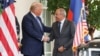 US President Donald Trump and Armenian Prime Minister Nikol Pashinian shake hands. (file photo)