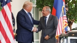 US President Donald Trump and Armenian Prime Minister Nikol Pashinian shake hands. (file photo)