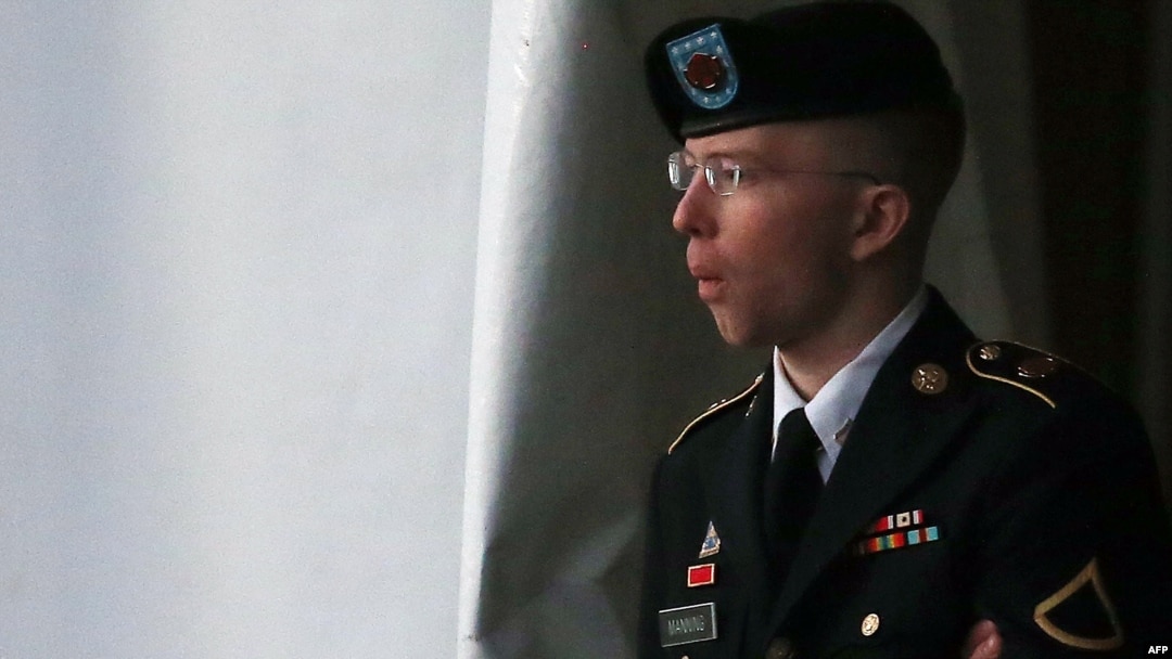 Private First Class Bradley Manning is escorted from a hearing in Fort Meade, Maryland in January.