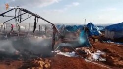 Авиаудар по лагерю беженцев в Сирии (видео)