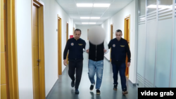 ბრალდებულის დაკავების ამსახველი კადრი