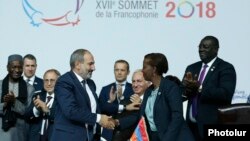 Armenia - Armenian Prime Minister Nikol Pashinian congratulates Louise Mushikiwabo, new head of the International Organization of La Francophonie (OIF), at a summit in Yerevan, 12 October 2018.