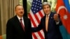 Austria - U.S. Secretary of State John Kerry (R) gestures next to President Ilham Aliyev of Azerbaijan during a bilateral meeting in Vienna, Austria, May 16, 2016