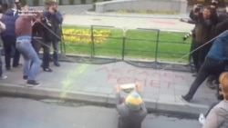 Macedonian Activists Use Paint Slingshot To Target Government Building