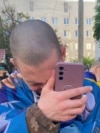 Ukraine - freed prisoners, both military and civilians, return to Ukraine after prisoner swap - screen grab