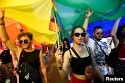 People march in the Budapest Pride parade in July 2021.
